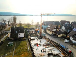 Luftaufnahme der Baugrube beim Aushub und Betonieren der Negativ Bodenplatte - 05.03.2018 Luftaufnahme der Baugrube beim Aushub und Betonieren der Negativ Bodenplatte - 05.03.2018